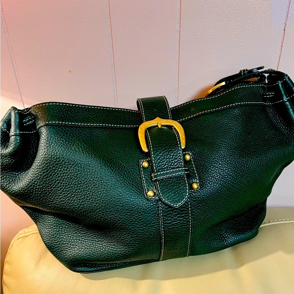 Dooney & Bourke genuine leather bag in very good condition approx 16x9 5x3